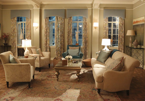 Olivia Pope's apartment is classic and traditional, neutral with pops of blue.
