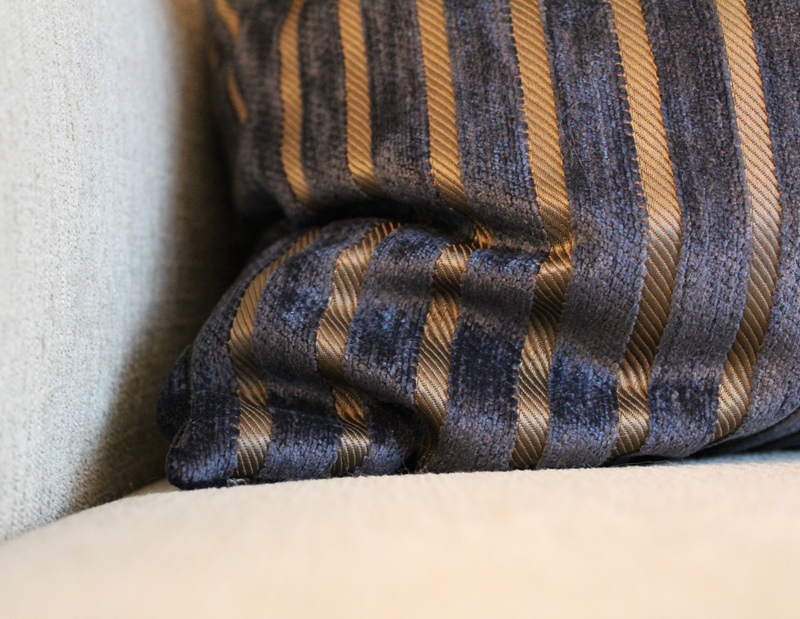 black and brown striped pillow
