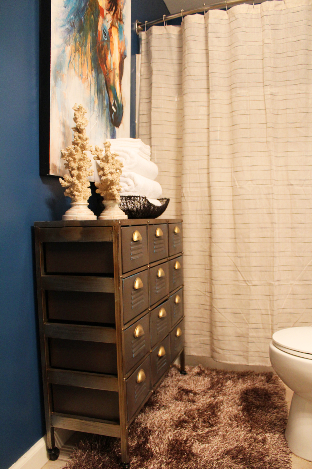 eclectic, blue guest bathroom