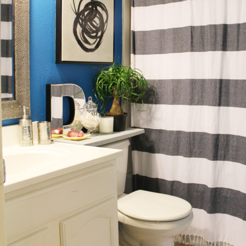 small blue apartment bathroom