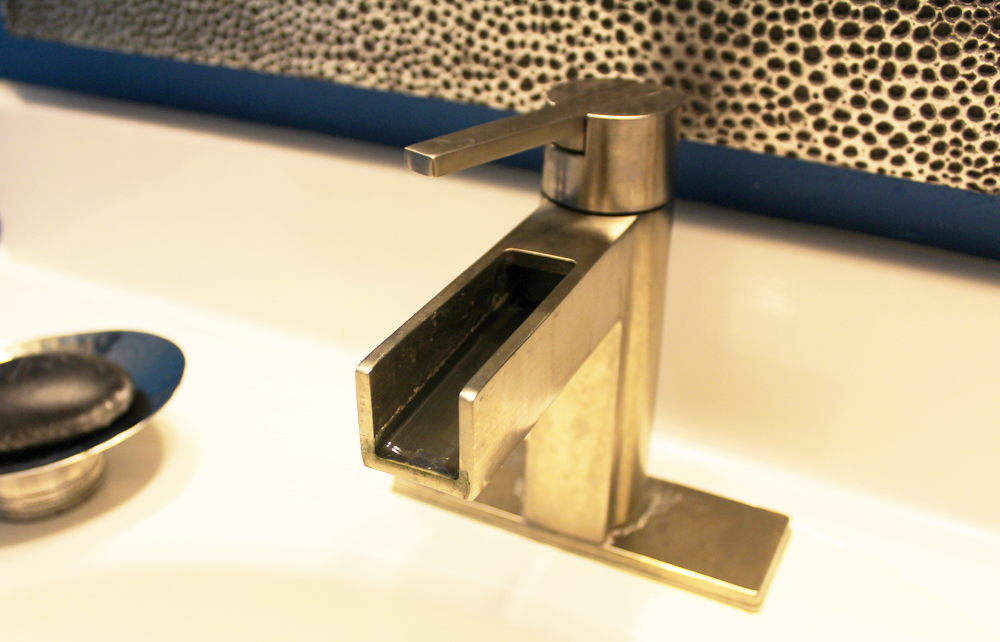 small blue apartment bathroom