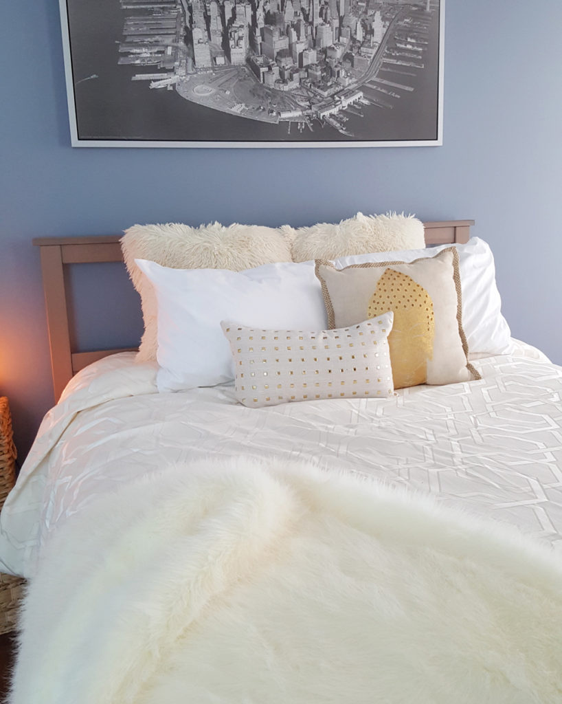 bedroom decor | blue bedroom | fur pillows | fur throw
