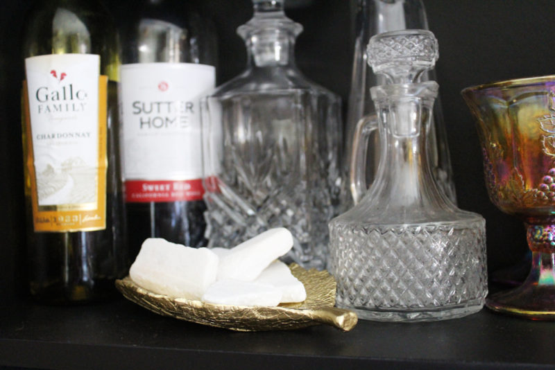 painted black bookcase with doors | bookase in living room | bookcase styling