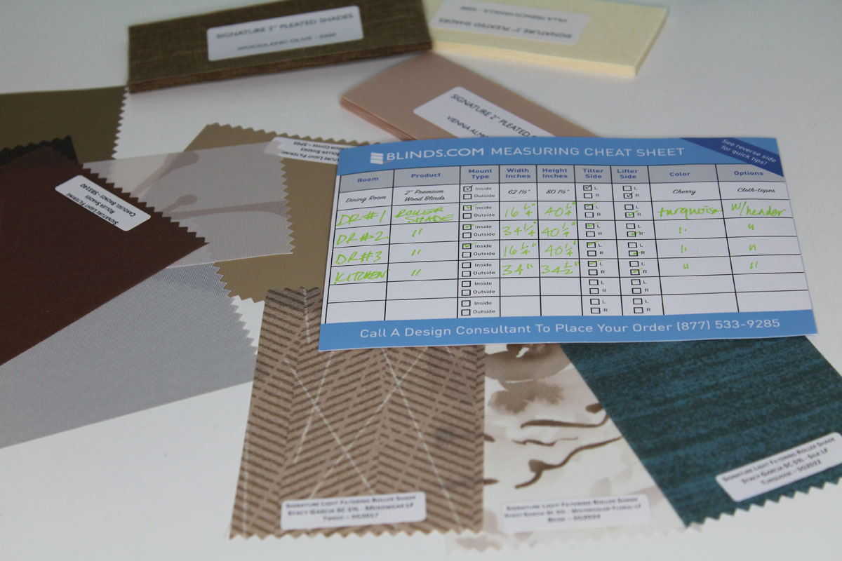 roller shades in a kitchen with blinds.com | custom window treatments | custom roller shades