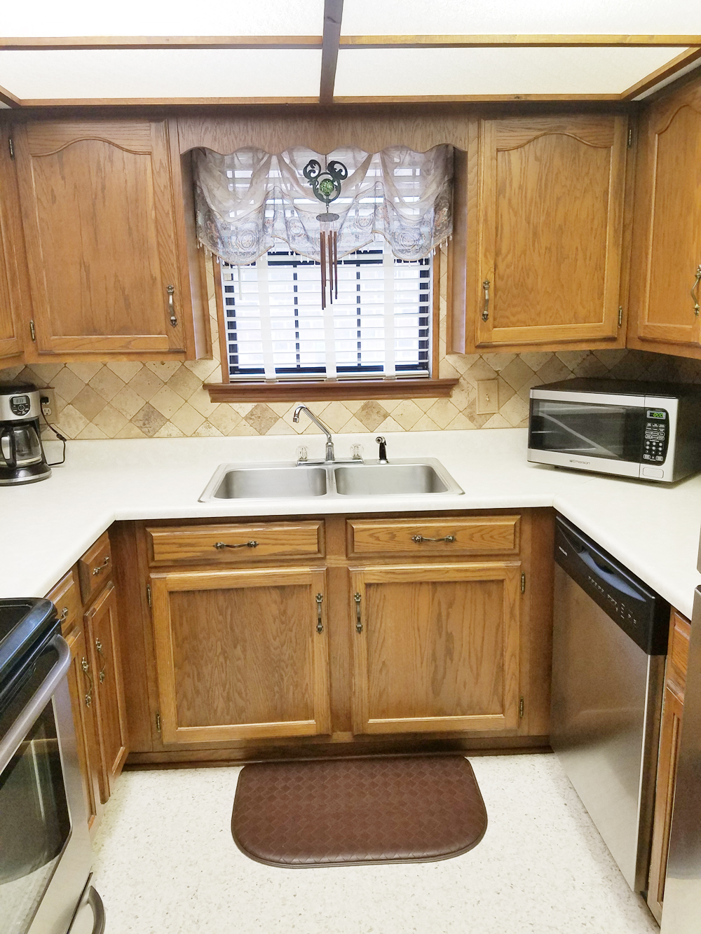 whitney j decor | kitchen before | white kitchen decor | one room challenge