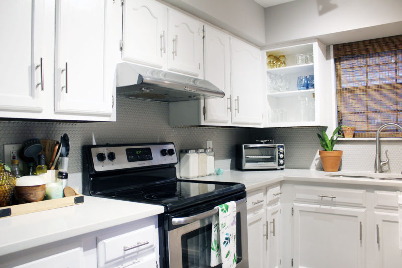 caesarstone london grey countertops | caesarstone countertops | gray and white kitchen reveal whitney j decor | caesarstone countertops | gray and white kitchen | small gray kitchen | small galley kitchen | small white kitchen | small space kitchens | tiny kitchen decor | gray and white kitchen decor | white kitchen decor | new orleans interior design | new orleans decor | new orleans homes | nola homes | nola decorator | new orleans decorator