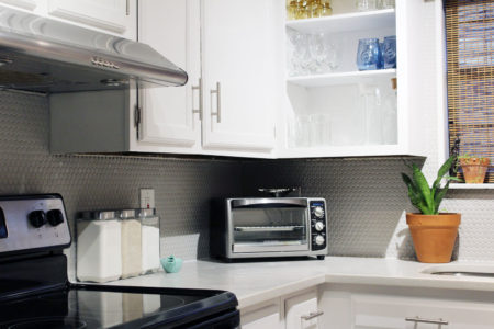 caesarstone london grey countertops | caesarstone countertops | gray and white kitchen reveal whitney j decor | caesarstone countertops | gray and white kitchen | small gray kitchen | small galley kitchen | small white kitchen | small space kitchens | tiny kitchen decor | gray and white kitchen decor | white kitchen decor | new orleans interior design | new orleans decor | new orleans homes | nola homes | nola decorator | new orleans decorator