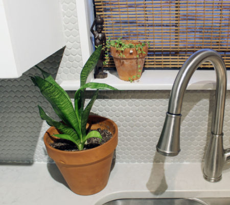 caesarstone london grey countertops | caesarstone countertops | gray and white kitchen reveal whitney j decor | caesarstone countertops | gray and white kitchen | small gray kitchen | small galley kitchen | small white kitchen | small space kitchens | tiny kitchen decor | gray and white kitchen decor | white kitchen decor | new orleans interior design | new orleans decor | new orleans homes | nola homes | nola decorator | new orleans decorator