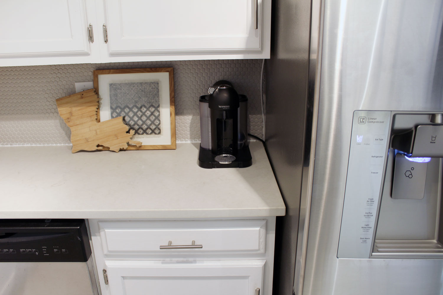 caesarstone london grey countertops | caesarstone countertops | gray and white kitchen reveal whitney j decor | caesarstone countertops | gray and white kitchen | small gray kitchen | small galley kitchen | small white kitchen | small space kitchens | tiny kitchen decor | gray and white kitchen decor | white kitchen decor | new orleans interior design | new orleans decor | new orleans homes | nola homes | nola decorator | new orleans decorator
