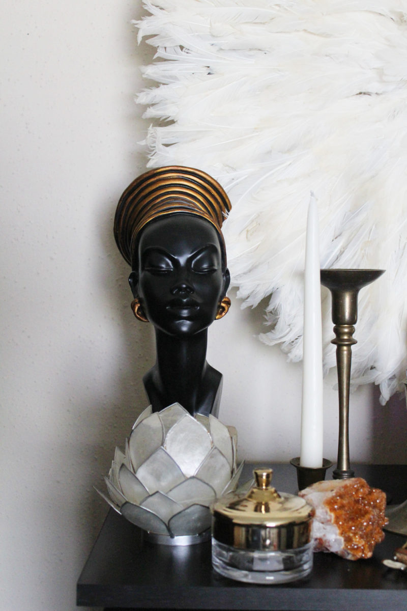 neutral eclectic bedroom | white juju hat | african woman sculpture | african woman small statue | sundays best