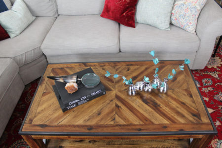 red and blue transitional living room | whitney j decor | new orleans homes | nola decor | red pillows | green walls | sherwin williams oyster gray on the walls | vintage red rug | pottery barn sectional | convertible coffee table | new orleans interior designer | new orleans decorator | new orleans blogger | nola interior designer | nola decorator | nola blogger