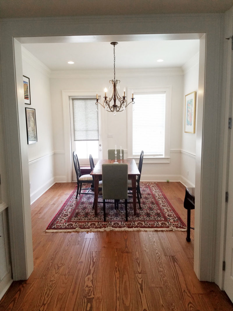 blue transitional dining room and white entryway