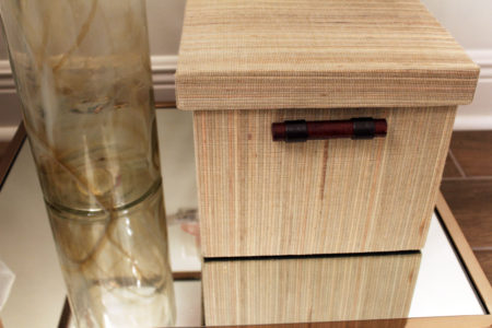 colorful guest bedroom with white walls | gold glass side table