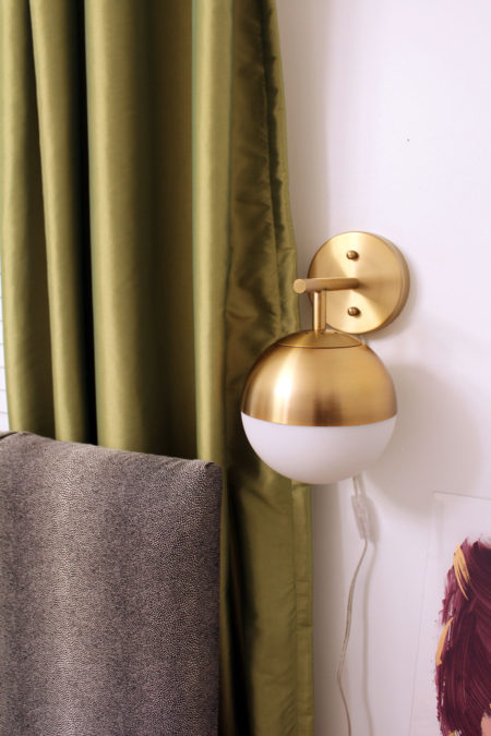 colorful guest bedroom with white walls