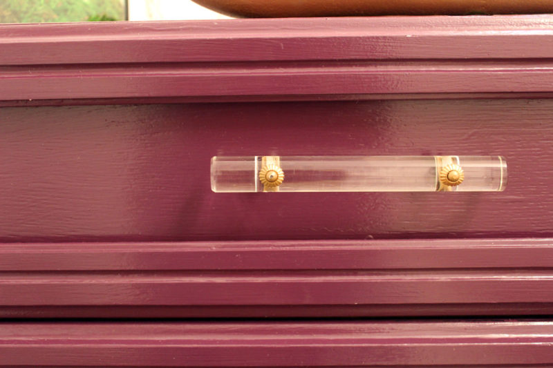 purple dresser and gold geometric mirror