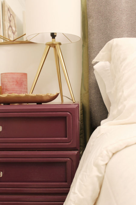 purple dresser and gold geometric mirror