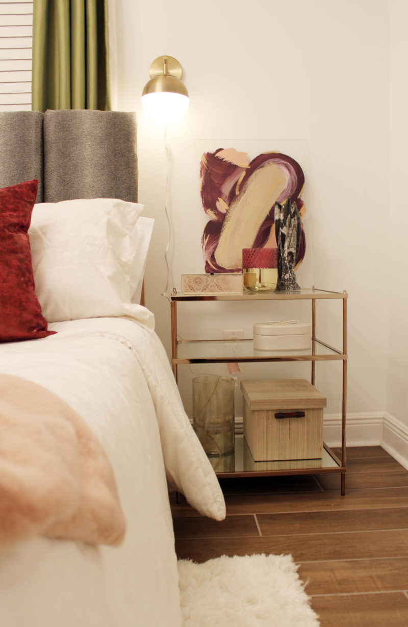 colorful guest bedroom with white walls