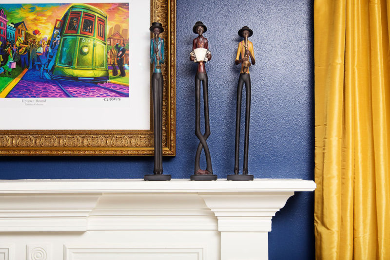 blue walls with african american jazz sculptures