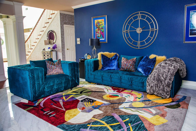 blue walls in colorful living room