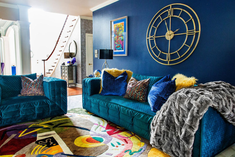 blue walls in colorful living room