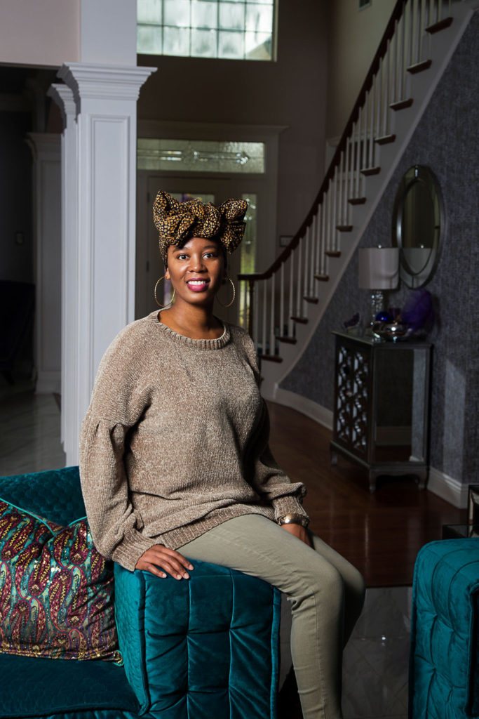 Whitney Jones of Whitney J Decor in bold, blue and green living room