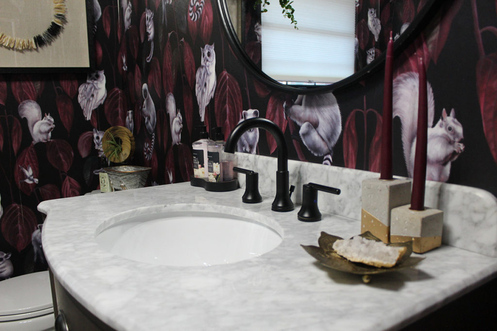 bold wallpaper in a laundry room