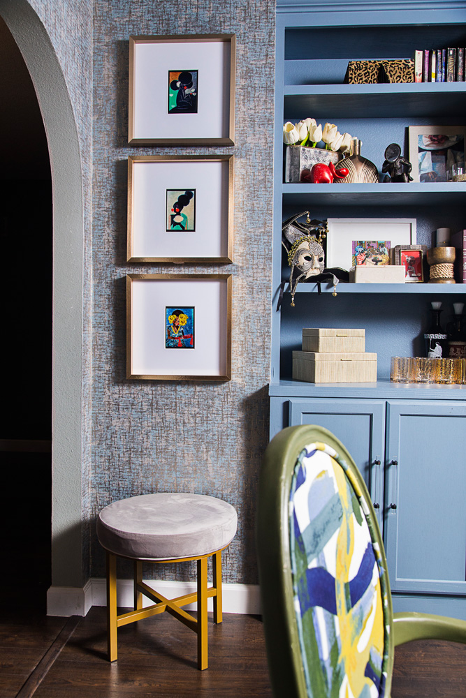 glam wallpaper and blue built in in dining room