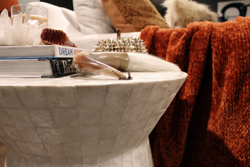 fall decor inspiration - burnt orange throw with capiz table