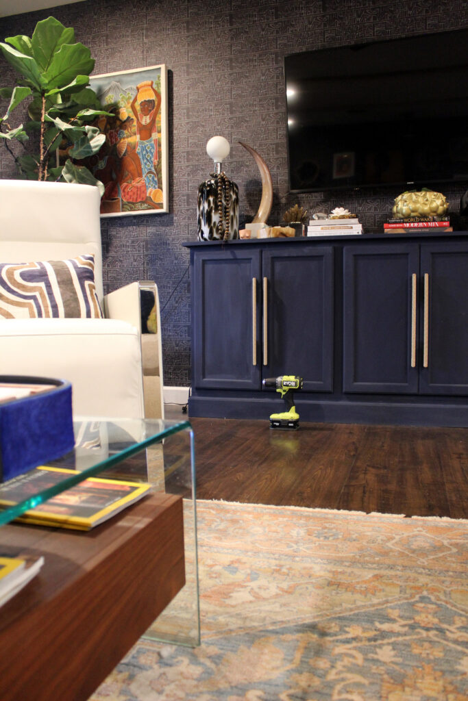 moody living room with blue diy media console
